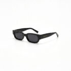 KOWN AURA — chunky black rectangular sunglasses with dark lenses, three-quarter view
