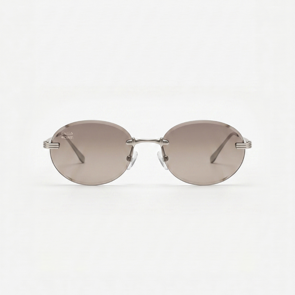Eon-1 KOWN EON — rimless oval sunglasses with rose-to-taupe gradient lenses, front view