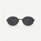 KOWN MIDNIGHT — rimless oval sunglasses in black metal with solid black lenses, front view