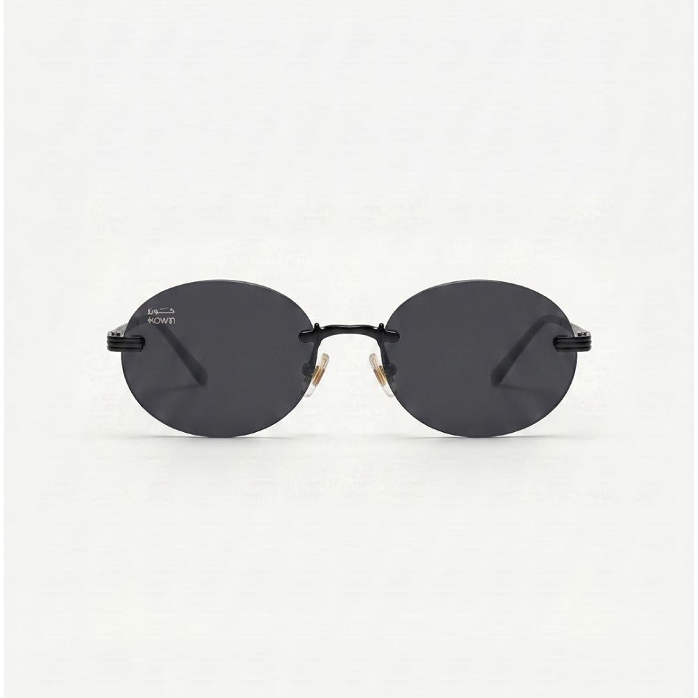 Midnight-1 KOWN MIDNIGHT — rimless oval sunglasses in black metal with solid black lenses, front view