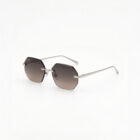 KOWN MOCHA — rimless octagonal sunglasses with brown gradient lenses, three-quarter view