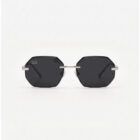 KOWN NOIR — rimless octagonal sunglasses with solid black lenses, front view