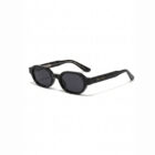KOWN VOID — black rounded octagonal sunglasses with solid black lenses, three-quarter view